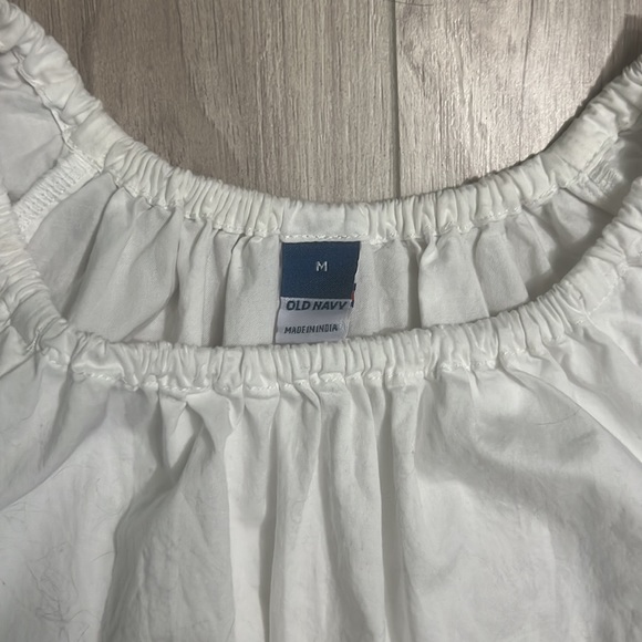 White old navy dress. Open pieces in each side showing midriff. Size medium. - Picture 2 of 5